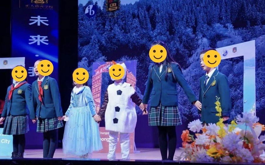 Students performing Who We Are in Chongqing on stage